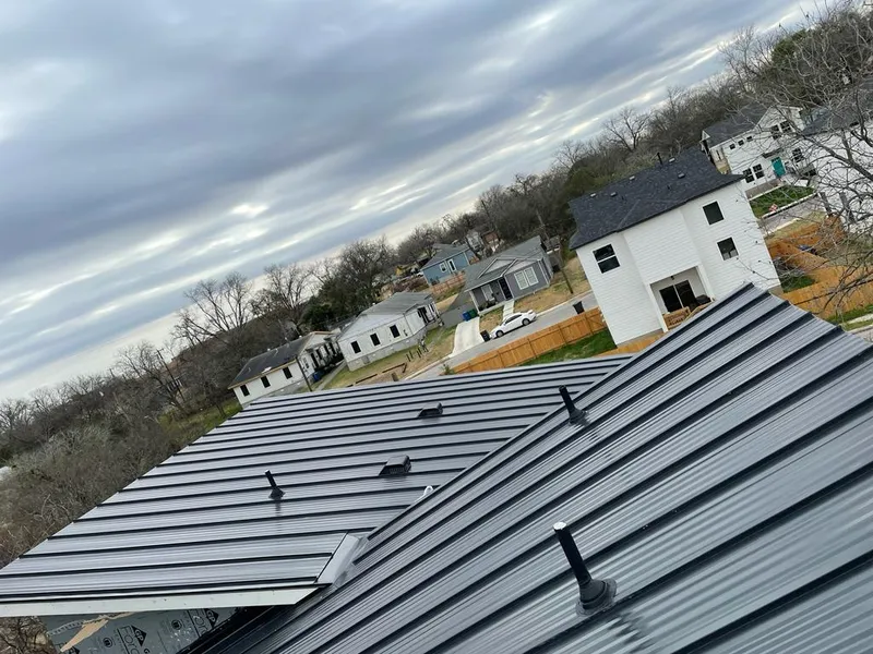 Standing seam metal roof panels with vents for Skylight Repair in Orchard Homes
